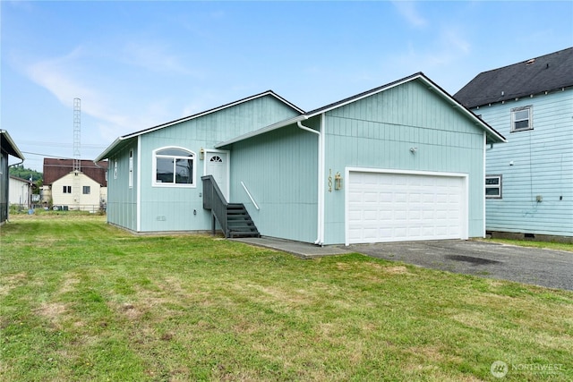 1604 W Market St, Aberdeen, WA 98520 - view of front of property with asphalt driveway, a garage, and a front yard