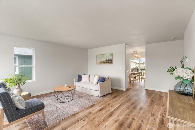 1604 W Market St, Aberdeen, WA 98520 - living room with light wood-type flooring and healthy amount of natural light