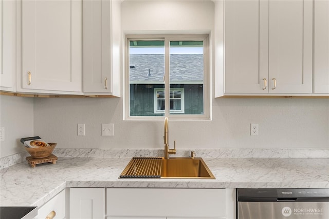 1604 W Market St, Aberdeen, WA 98520 - kitchen with stainless steel dishwasher and white cabinets