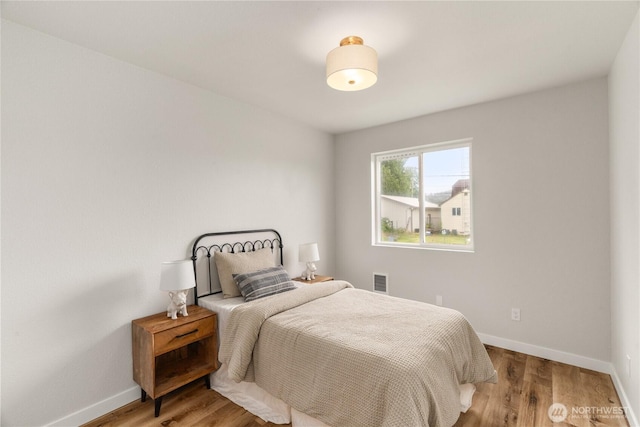 1604 W Market St, Aberdeen, WA 98520 - bedroom featuring baseboards and wood finished floors