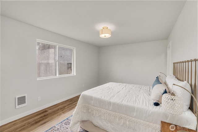 1604 W Market St, Aberdeen, WA 98520 - bedroom featuring baseboards and wood finished floors