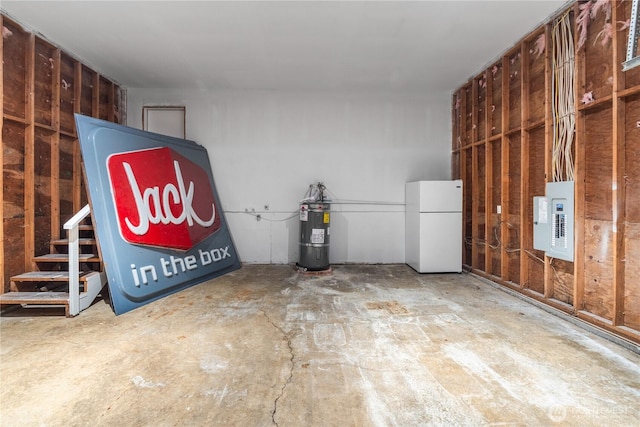 1604 W Market St, Aberdeen, WA 98520 - garage with freestanding refrigerator, water heater, and electric panel