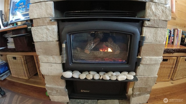 1200 Lincoln St Unit 148, Bellingham, WA 98229 - detailed view of wood finished floors and a wood stove