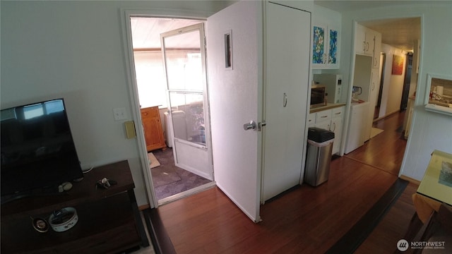 1200 Lincoln St Unit 148, Bellingham, WA 98229 - hallway with dark wood finished floors