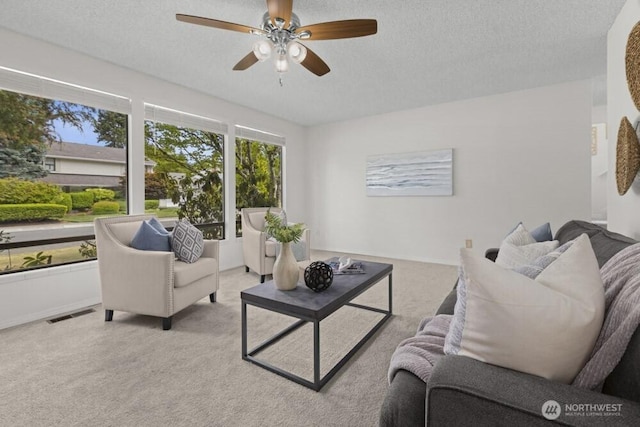 31609 41st Ave SW, Federal Way, WA 98023 - living area with a textured ceiling, ceiling fan, and carpet