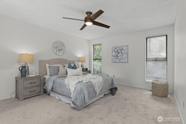 31609 41st Ave SW, Federal Way, WA 98023 - carpeted bedroom featuring ceiling fan and a textured ceiling