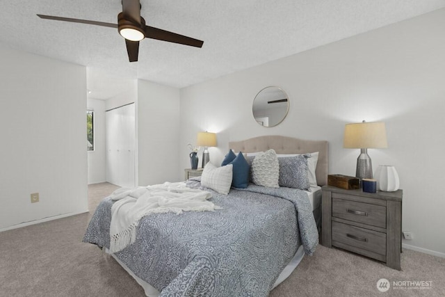 31609 41st Ave SW, Federal Way, WA 98023 - carpeted bedroom with a closet, ceiling fan, and a textured ceiling