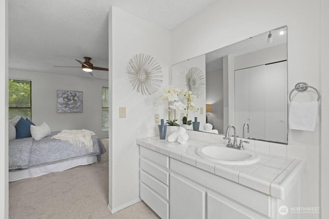 31609 41st Ave SW, Federal Way, WA 98023 - ensuite bathroom with vanity and ceiling fan