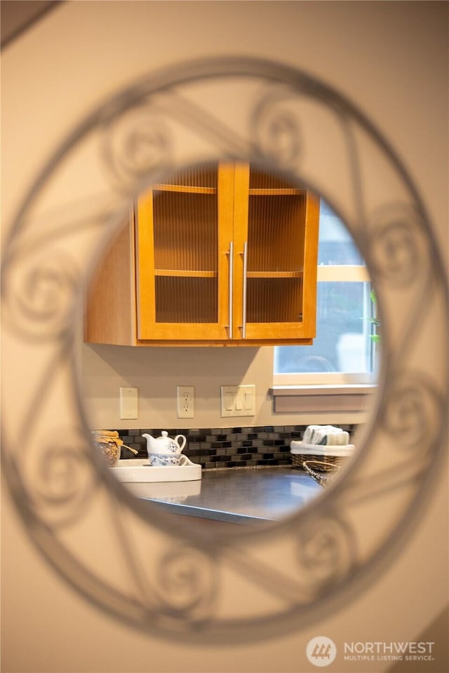 923 N 85th St Unit A, Seattle, WA 98103 - detailed view of dark countertops and glass insert cabinets
