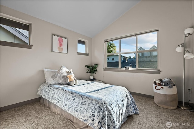 923 N 85th St Unit A, Seattle, WA 98103 - carpeted bedroom featuring lofted ceiling and baseboards