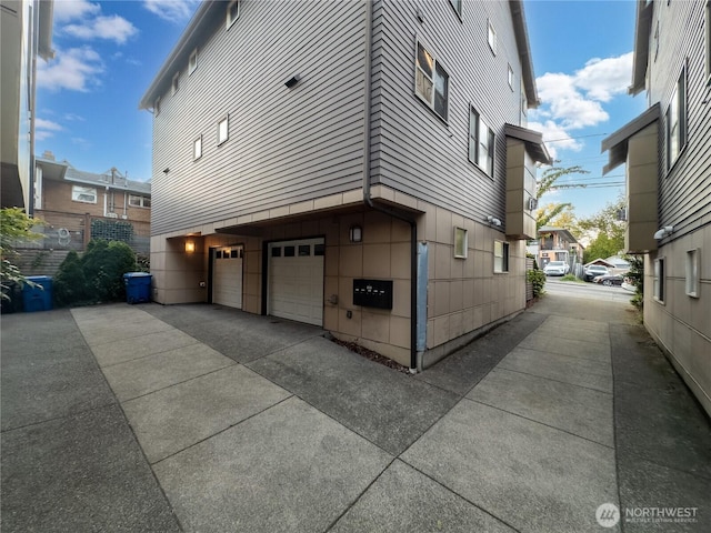 923 N 85th St Unit A, Seattle, WA 98103 - view of side of home with a garage