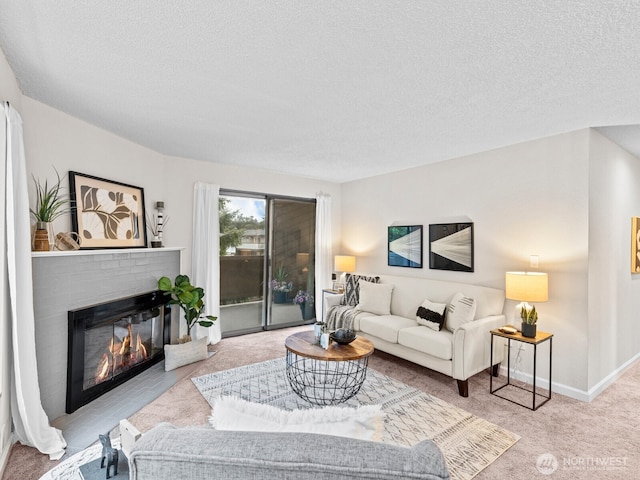 4920 200th St SW Unit A201, Lynnwood, WA 98036 - carpeted living area with a textured ceiling and a fireplace
