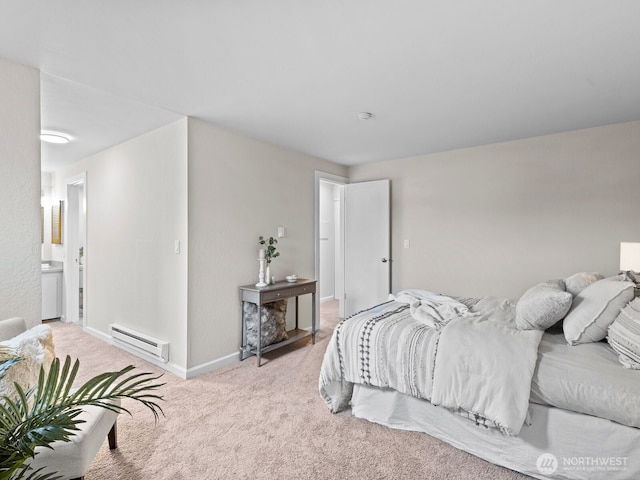 4920 200th St SW Unit A201, Lynnwood, WA 98036 - bedroom featuring baseboard heating, light colored carpet, and connected bathroom