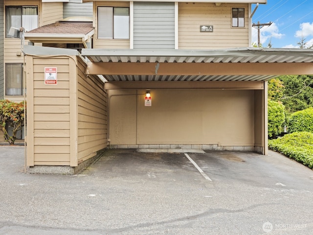 4920 200th St SW Unit A201, Lynnwood, WA 98036 - view of front of house with covered parking