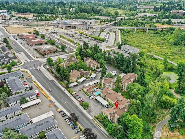 4920 200th St SW Unit A201, Lynnwood, WA 98036 - drone / aerial view of a tree filled landscape and an industrial area