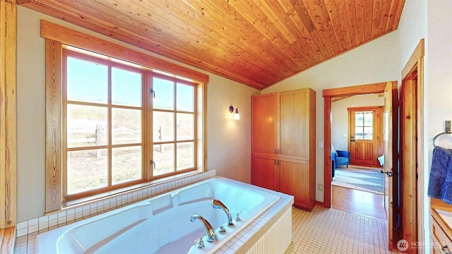 156 Poechmann Rd, Okanogan, WA 98840 - full bathroom featuring vaulted ceiling, a tub with jets, tile patterned floors, and wood ceiling