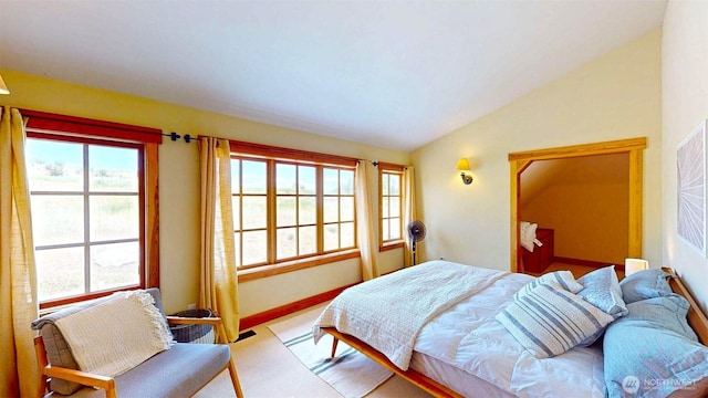 156 Poechmann Rd, Okanogan, WA 98840 - carpeted bedroom featuring lofted ceiling and multiple windows
