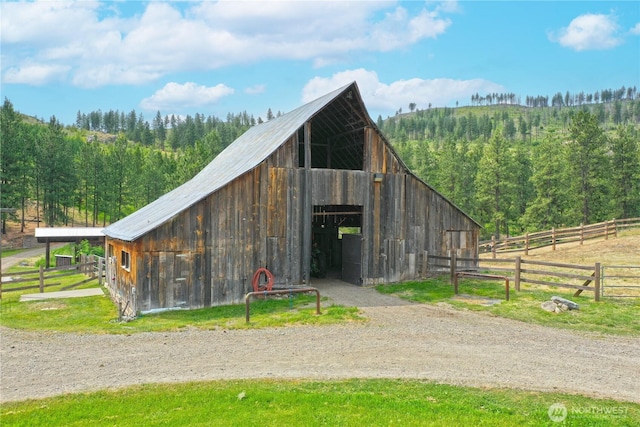 156 Poechmann Rd, Okanogan, WA 98840 - view of barn featuring a view of trees and dirt driveway
