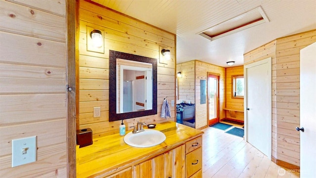 156 Poechmann Rd, Okanogan, WA 98840 - bathroom with wood walls, wood finished floors, and vanity