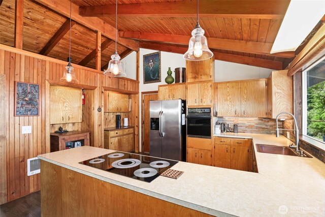 10806 W Morris Blvd, Steilacoom, WA 98388 - kitchen with black appliances, light countertops, wooden walls, wood ceiling, and dark wood-style floors