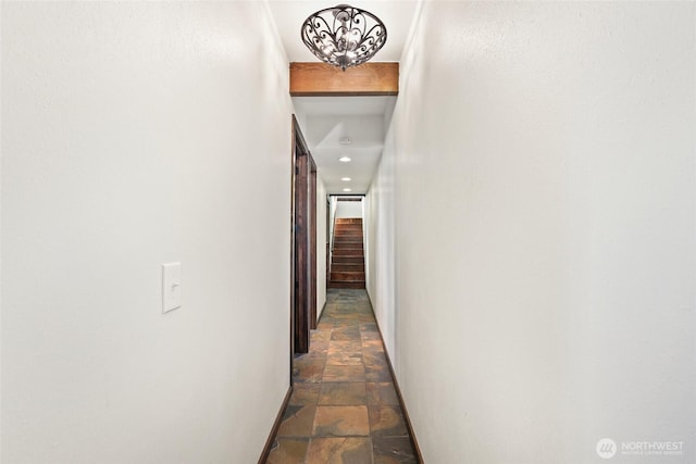 10806 W Morris Blvd, Steilacoom, WA 98388 - corridor featuring stone tile flooring and baseboards