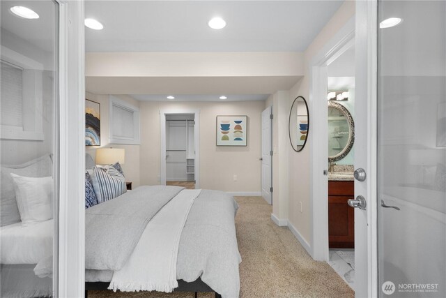 12712 NE 157th St, Woodinville, WA 98072 - bedroom with ensuite bath, light colored carpet, and recessed lighting