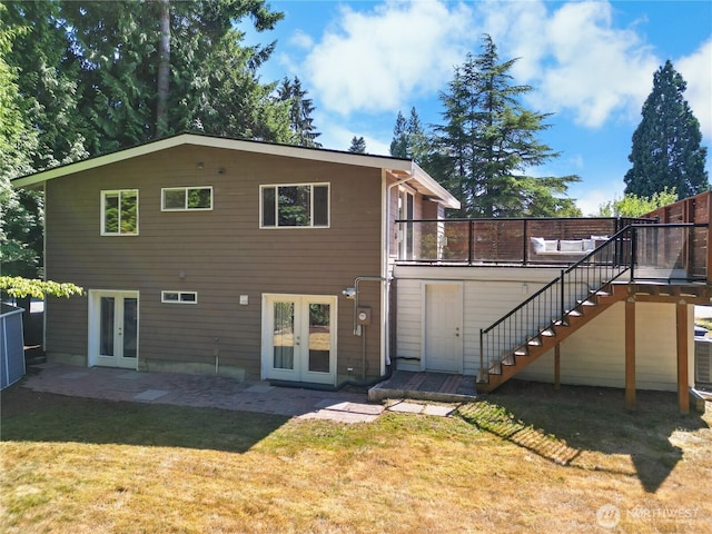 12712 NE 157th St, Woodinville, WA 98072 - back of house with french doors, stairway, a lawn, a deck, and a patio