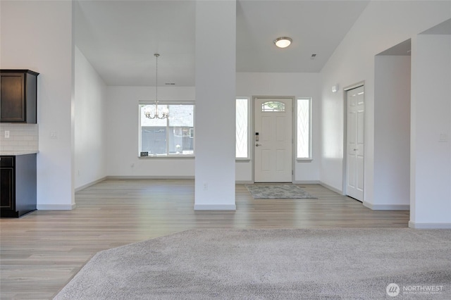 232 Jett Ct, Montesano, WA 98563 - entrance foyer with a chandelier and light wood-type flooring