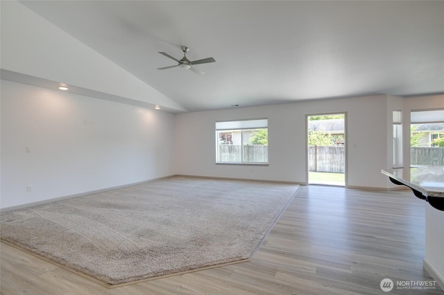 232 Jett Ct, Montesano, WA 98563 - unfurnished living room featuring lofted ceiling, light wood-style floors, and a ceiling fan