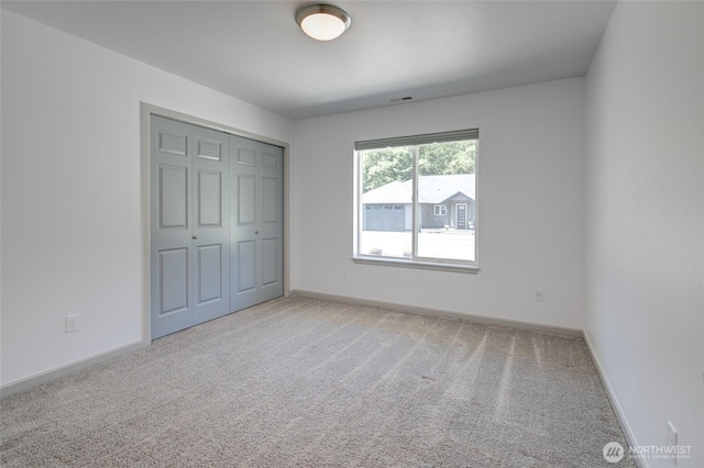 232 Jett Ct, Montesano, WA 98563 - unfurnished bedroom with light carpet and a closet