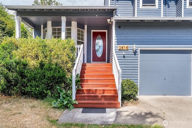 2819 SW 350th Pl, Federal Way, WA 98023 - property entrance featuring a garage and concrete driveway
