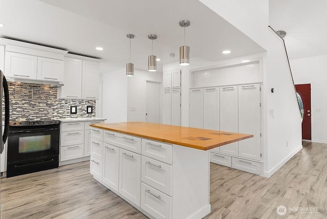 2819 SW 350th Pl, Federal Way, WA 98023 - kitchen featuring gas stove, butcher block counters, decorative backsplash, white cabinets, and light wood-type flooring