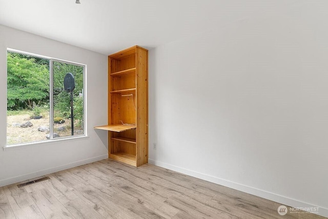 2819 SW 350th Pl, Federal Way, WA 98023 - unfurnished room with light wood-style floors and baseboards