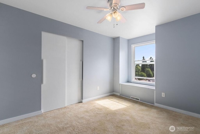 2819 SW 350th Pl, Federal Way, WA 98023 - unfurnished bedroom featuring carpet floors and ceiling fan