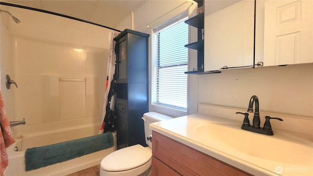 869 Mahogany Ln NW, Silverdale, WA 98383 - bathroom featuring healthy amount of natural light, shower / bath combo with shower curtain, and vanity