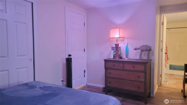 869 Mahogany Ln NW, Silverdale, WA 98383 - bedroom with wood finished floors and baseboards
