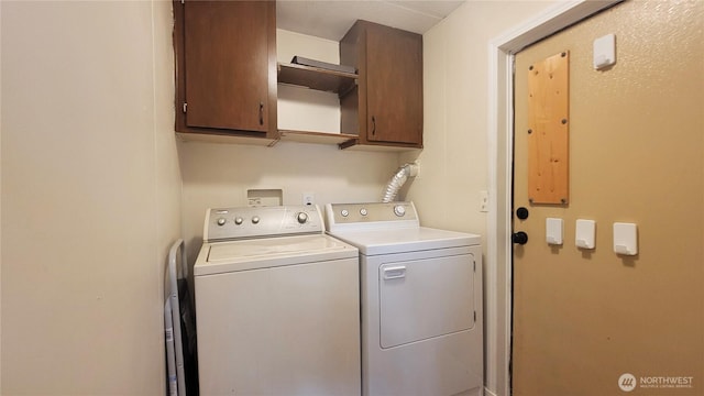 869 Mahogany Ln NW, Silverdale, WA 98383 - laundry area featuring cabinet space and washing machine and clothes dryer