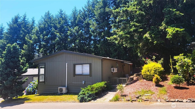 869 Mahogany Ln NW, Silverdale, WA 98383 - view of home's exterior featuring a cooling unit