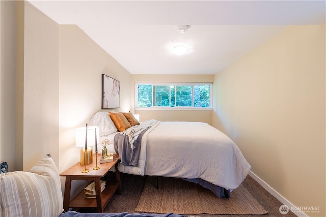 1525 Taylor Ave N Unit 505, Seattle, WA 98109 - bedroom featuring baseboards and carpet floors