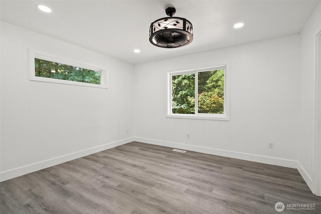 14115 Mountain Vista Dr SE, Yelm, WA 98597 - unfurnished room with recessed lighting and wood finished floors
