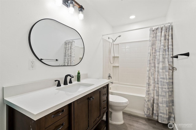14115 Mountain Vista Dr SE, Yelm, WA 98597 - bathroom featuring vanity, wood finished floors, and shower / tub combo