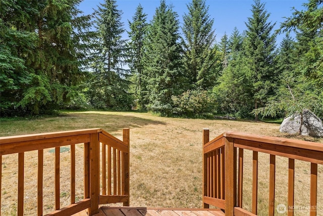 14115 Mountain Vista Dr SE, Yelm, WA 98597 - view of grassy yard featuring a deck