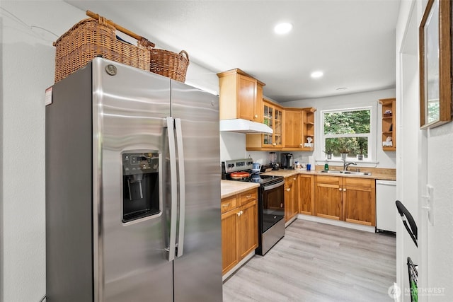 14115 Mountain Vista Dr SE, Yelm, WA 98597 - kitchen with appliances with stainless steel finishes, under cabinet range hood, light wood-style flooring, open shelves, and light countertops