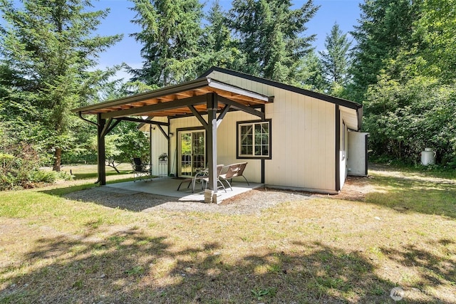 14115 Mountain Vista Dr SE, Yelm, WA 98597 - back of property with a patio and a yard
