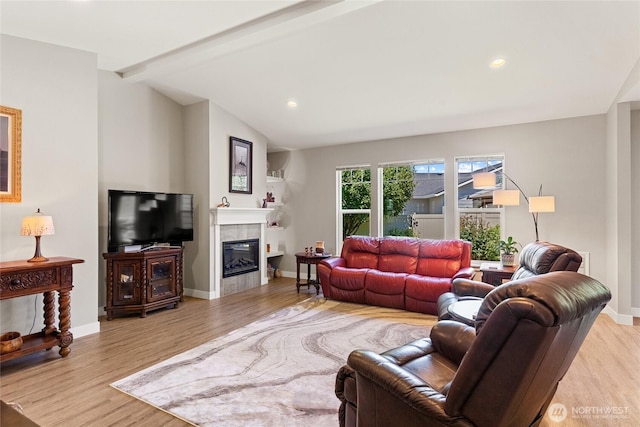 2219 Treat St SE, East Wenatchee, WA 98802 - living room with light wood-style flooring, a tile fireplace, and recessed lighting