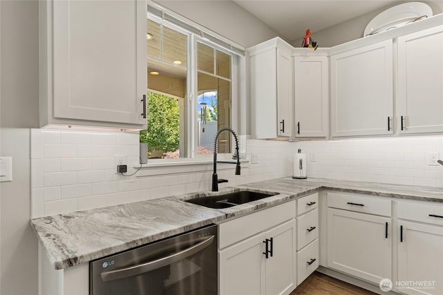 2219 Treat St SE, East Wenatchee, WA 98802 - kitchen featuring stainless steel dishwasher, white cabinets, backsplash, and light stone countertops