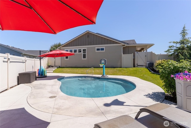 2219 Treat St SE, East Wenatchee, WA 98802 - view of pool with a gate, a fenced backyard, and a patio