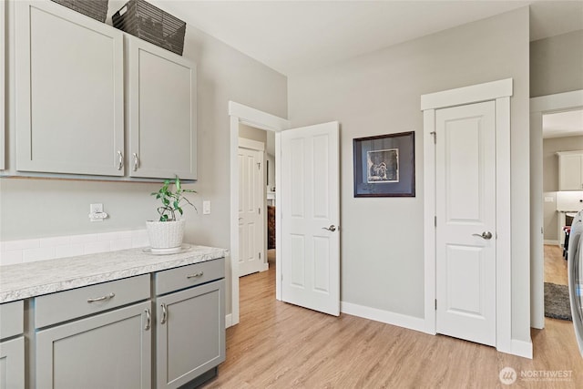 2219 Treat St SE, East Wenatchee, WA 98802 - kitchen featuring gray cabinets, light wood-type flooring, and light countertops