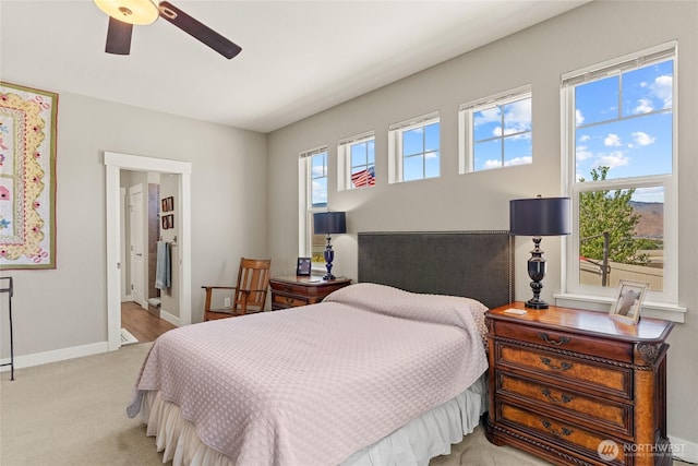2219 Treat St SE, East Wenatchee, WA 98802 - carpeted bedroom featuring ceiling fan and ensuite bathroom