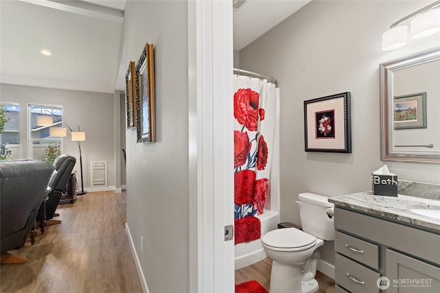 2219 Treat St SE, East Wenatchee, WA 98802 - full bath with vanity, wood finished floors, and shower / bath combination with curtain